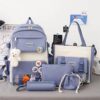 Sac a dos decor + sac a main + sacoche + porte monnaie
